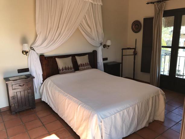 Imagen de la habitación del Hotel Hacienda Puerto De Las Muelas. Foto 2
