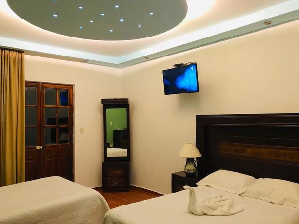 Imagen de la habitación del Hotel Hacienda Real. Foto 18