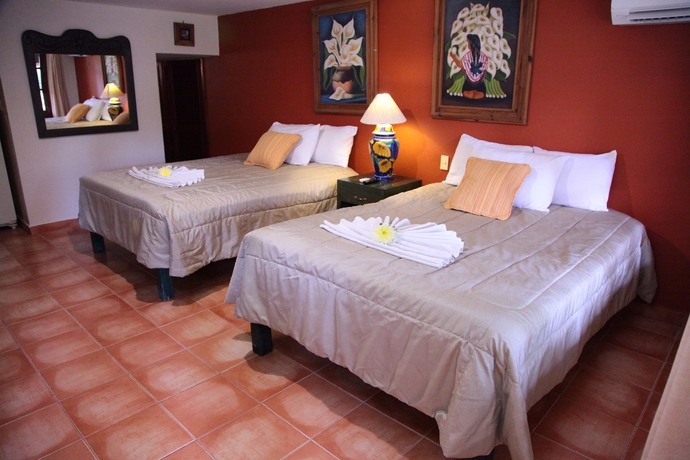 Imagen de la habitación del Hotel Hacienda San Miguel and Suites. Foto 3