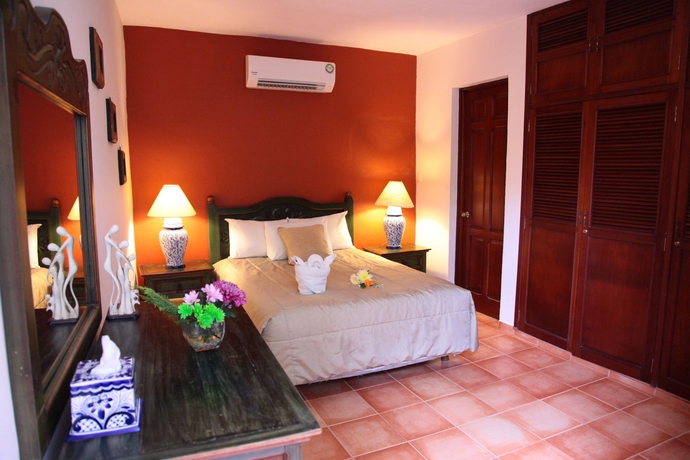 Imagen de la habitación del Hotel Hacienda San Miguel and Suites. Foto 4