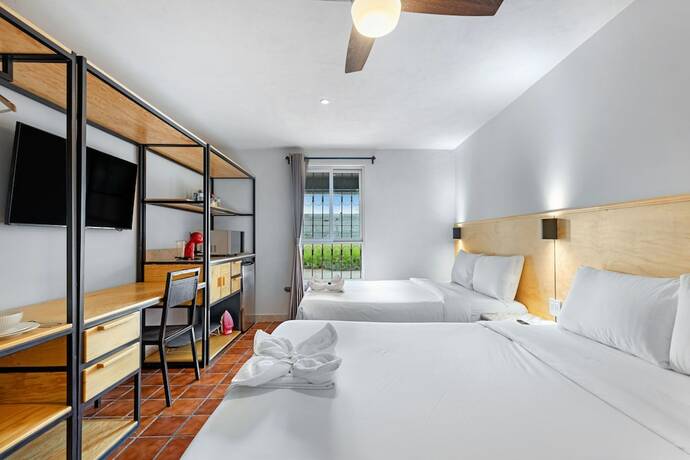 Imagen de la habitación del Hotel Hacienda Santa Barbara. Foto 18