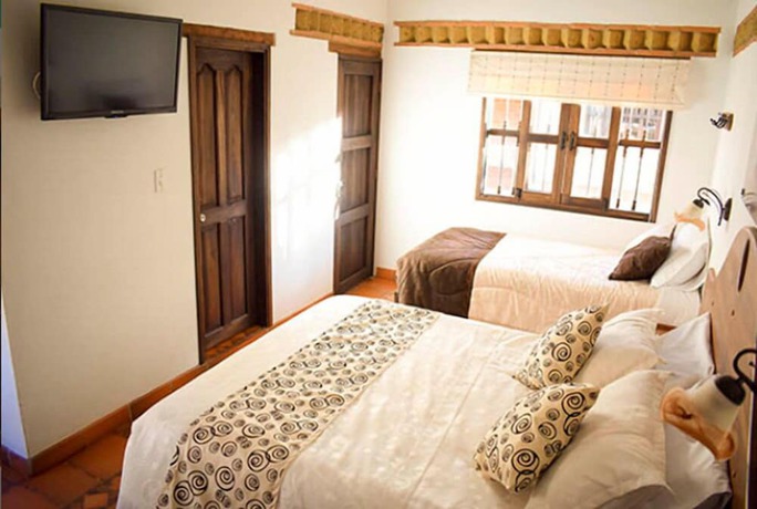 Imagen de la habitación del Hotel Hacienda Santa Cecilia. Foto 5
