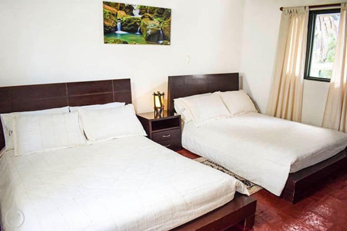 Imagen de la habitación del Hotel Hacienda Santa Cecilia. Foto 16