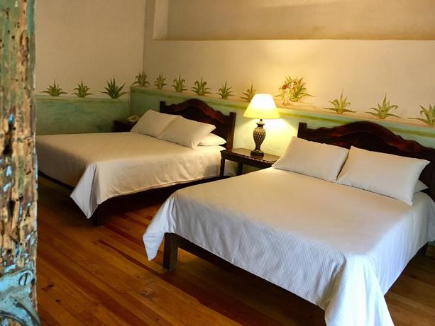 Imagen de la habitación del Hotel Hacienda Soltepec Suites Campo De Golf. Foto 7