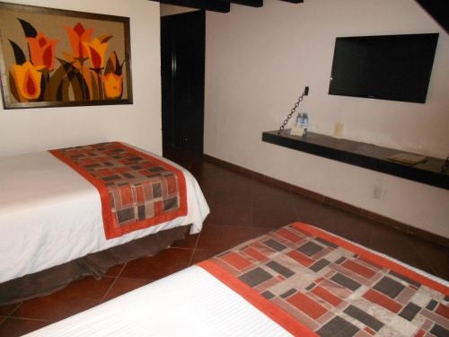 Imagen de la habitación del Hotel Hacienda Taboada. Foto 7