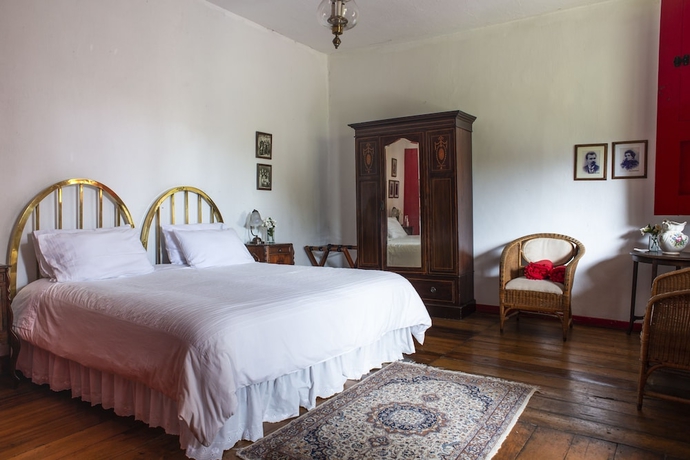 Imagen de la habitación del Hotel Hacienda Venecia Main House and Coffee Lodge. Foto 11