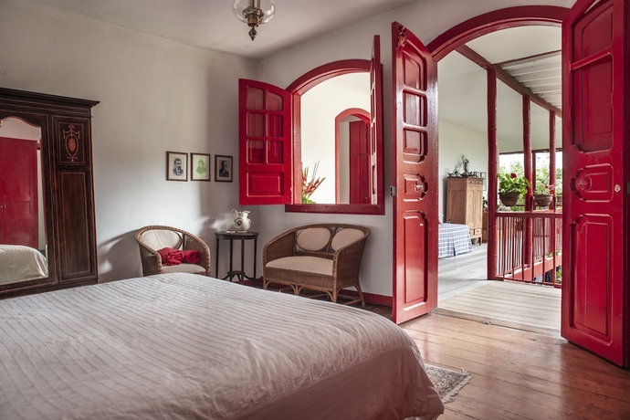 Imagen de la habitación del Hotel Hacienda Venecia Main House and Coffee Lodge. Foto 12