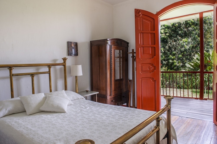 Imagen de la habitación del Hotel Hacienda Venecia Main House and Coffee Lodge. Foto 13