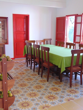 Imagen del bar/restaurante del Hotel Hacienda Venecia Main House and Coffee Lodge. Foto 4