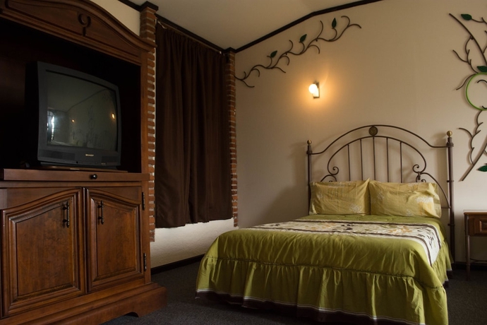 Imagen de la habitación del Hotel Hacienda Yemila. Foto 12