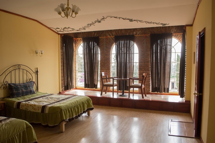 Imagen de la habitación del Hotel Hacienda Yemila. Foto 13