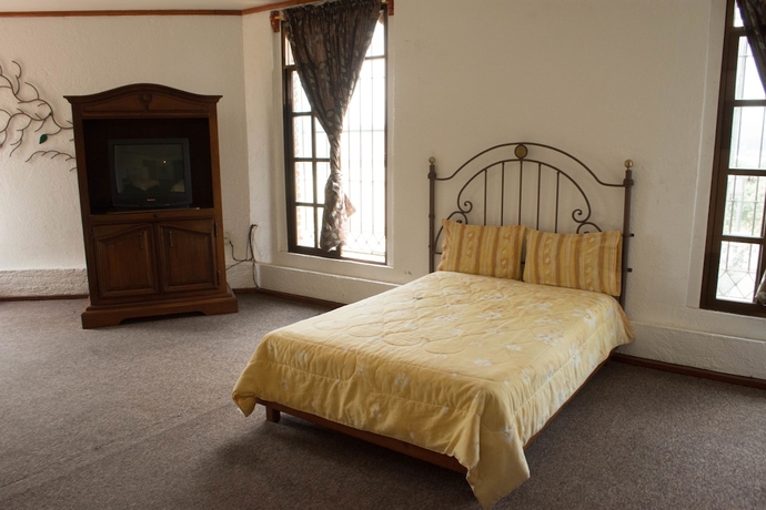 Imagen de la habitación del Hotel Hacienda Yemila. Foto 16