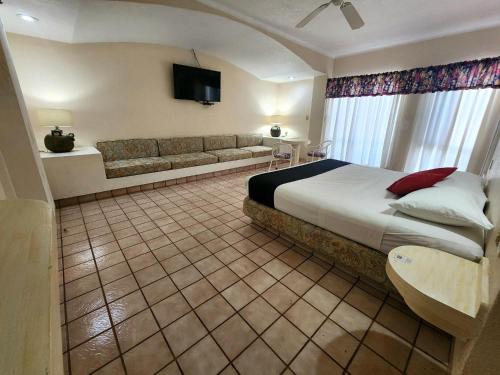 Imagen de la habitación del Hotel Hacienda del Rio Oaxtepec. Foto 9