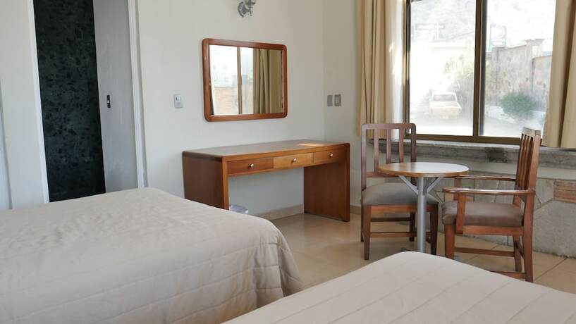 Imagen de la habitación del Hotel Hacienda las Higueras. Foto 14