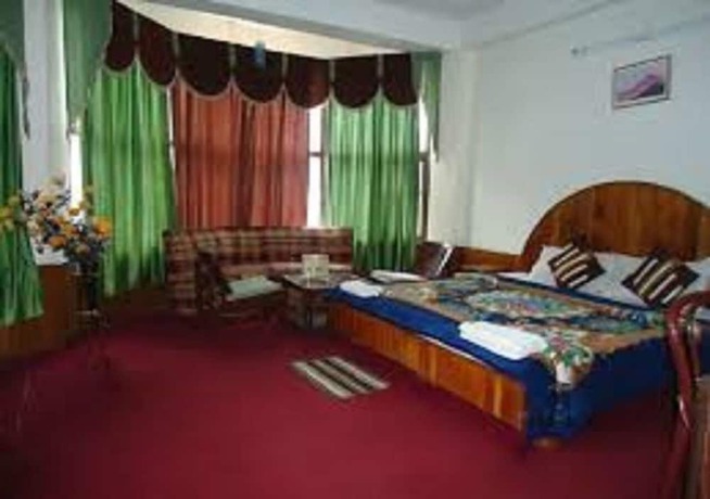 Imagen de la habitación del Hotel Hadimba Palace Manali. Foto 5