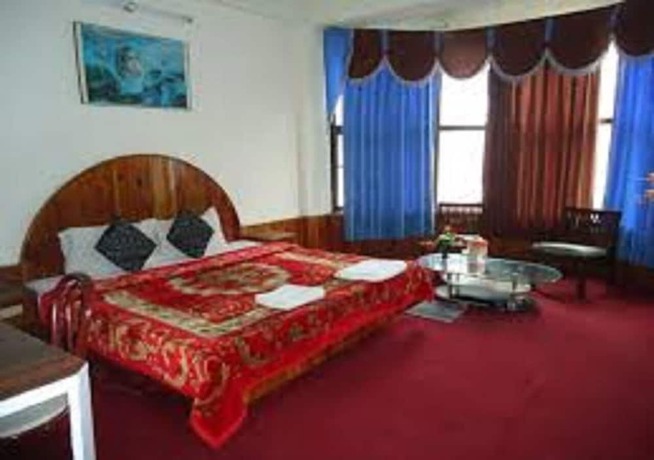 Imagen de la habitación del Hotel Hadimba Palace Manali. Foto 12