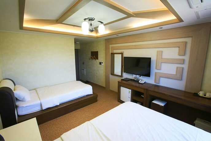 Imagen de la habitación del Hotel Hae Jeju. Foto 15