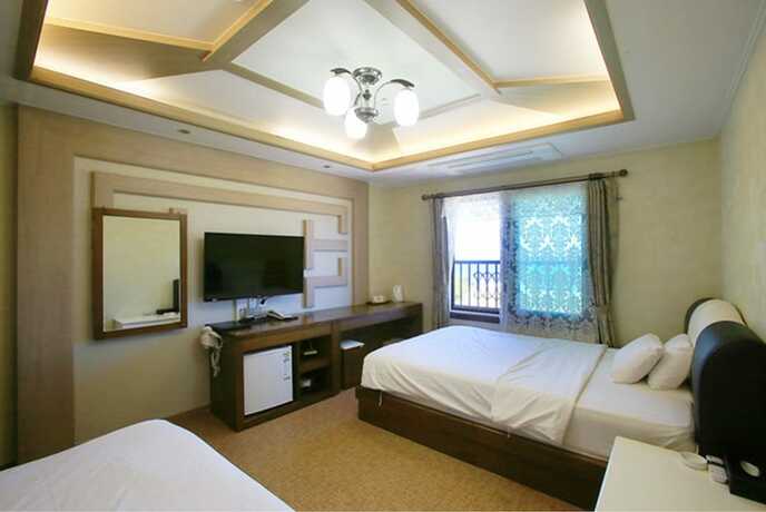 Imagen de la habitación del Hotel Hae Jeju. Foto 21