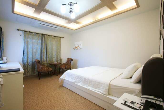 Imagen de la habitación del Hotel Hae Jeju. Foto 22