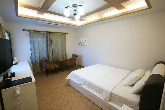 Imagen de la habitación del Hotel Hae Jeju. Foto 23