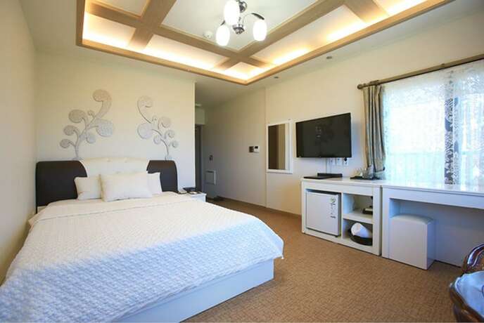 Imagen de la habitación del Hotel Hae Jeju. Foto 24