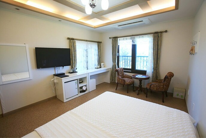 Imagen de la habitación del Hotel Hae Jeju. Foto 25