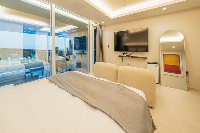 Imagen de la habitación del Hotel Haeilri Pool and Spa. Foto 13