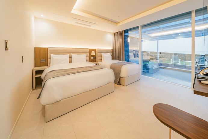 Imagen de la habitación del Hotel Haeilri Pool and Spa. Foto 17