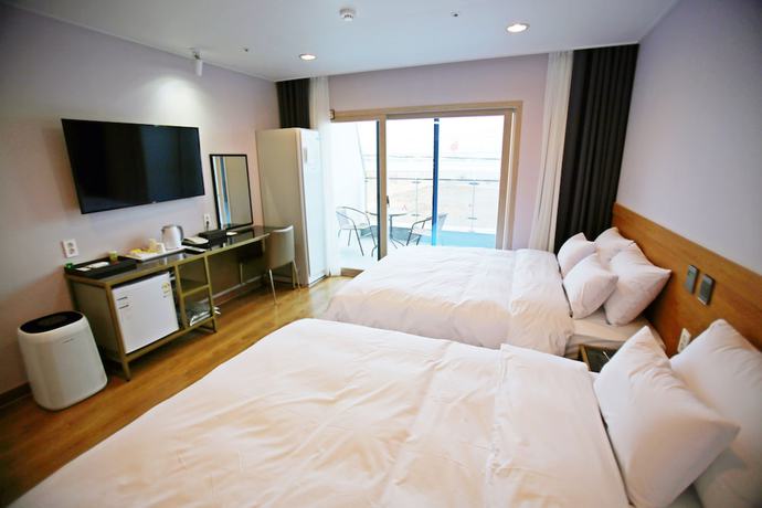 Imagen de la habitación del Hotel Haemaru. Foto 17