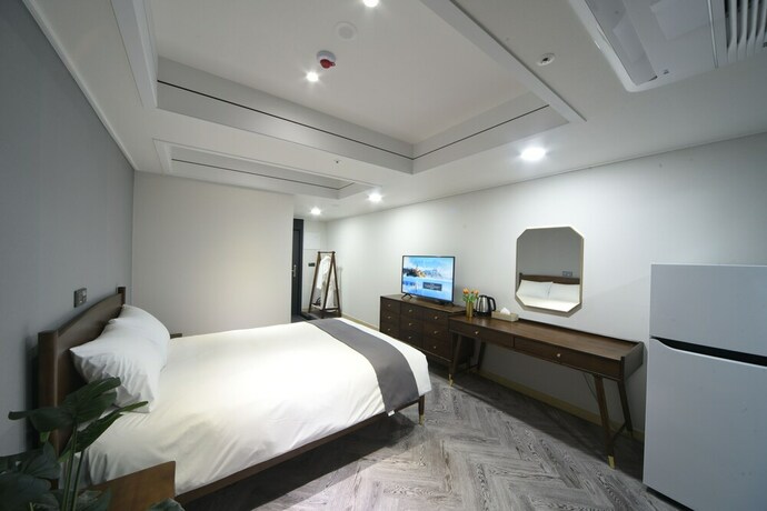 Imagen de la habitación del Hotel Haeundae Central. Foto 21