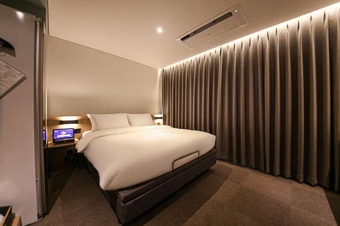 Imagen de la habitación del Hotel Haeundae Thevan. Foto 2
