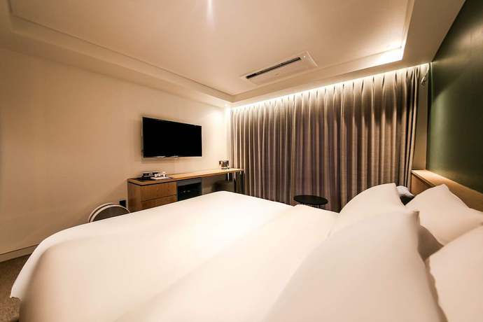 Imagen de la habitación del Hotel Haeundae Thevan. Foto 14