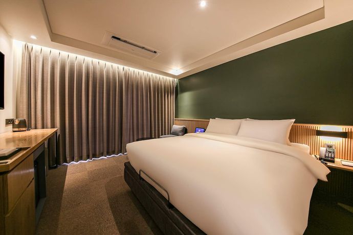 Imagen de la habitación del Hotel Haeundae Thevan. Foto 15