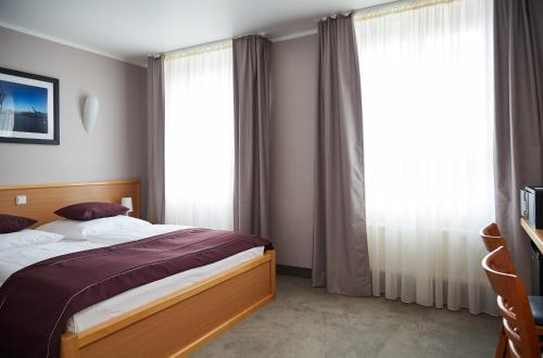 Imagen de la habitación del Hotel Hafentor. Foto 6