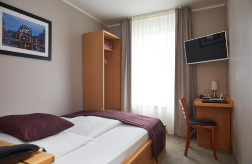 Imagen de la habitación del Hotel Hafentor. Foto 7