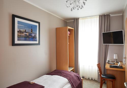 Imagen de la habitación del Hotel Hafentor. Foto 8
