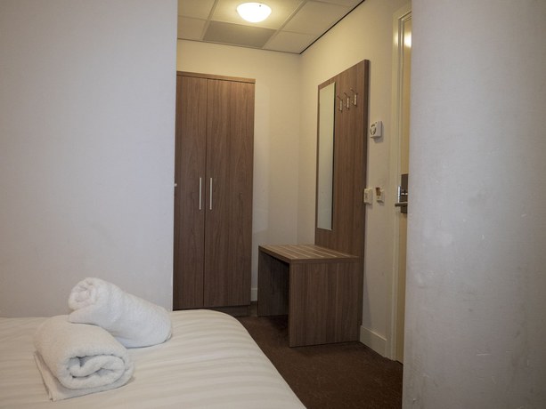 Imagen de la habitación del Hotel Hague Center. Foto 13
