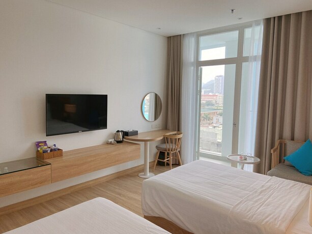 Imagen de la habitación del Hotel Hai Au Bien Cuong. Foto 35