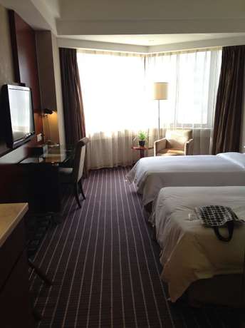 Imagen de la habitación del Hotel Hai Tian Hotel - Kunming. Foto 18