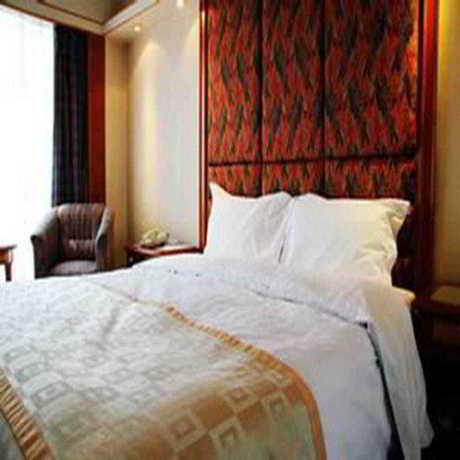 Imagen de la habitación del Hotel Hai Tian Qingdao. Foto 6