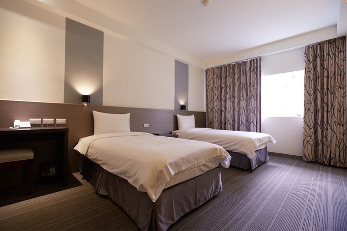 Imagen de la habitación del Hotel Haifu Garden. Foto 4