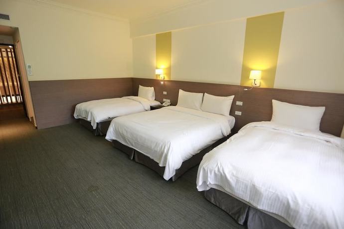 Imagen de la habitación del Hotel Haifu Garden. Foto 5