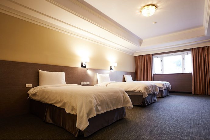 Imagen de la habitación del Hotel Haifu Garden. Foto 6