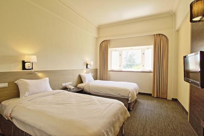 Imagen de la habitación del Hotel Haifu Garden. Foto 7
