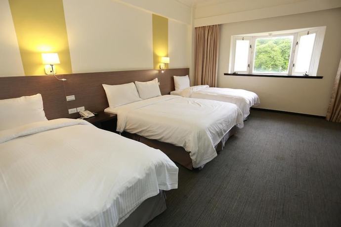 Imagen de la habitación del Hotel Haifu Garden. Foto 8
