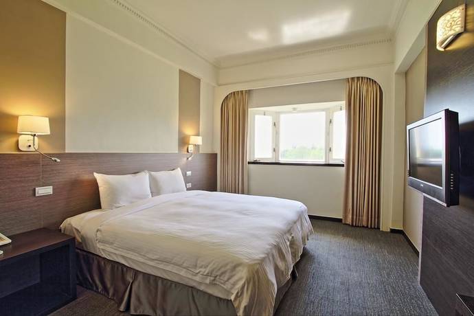 Imagen de la habitación del Hotel Haifu Garden. Foto 10