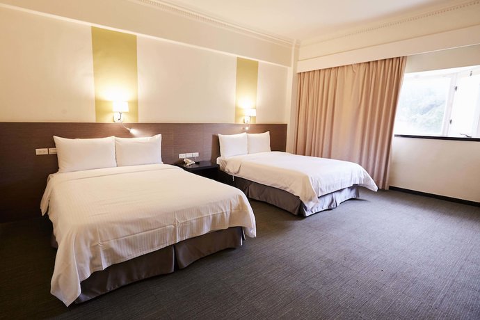 Imagen de la habitación del Hotel Haifu Garden. Foto 11