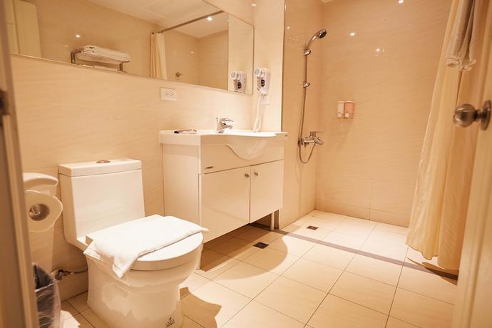 Imagen de la habitación del Hotel Haifu Garden. Foto 15