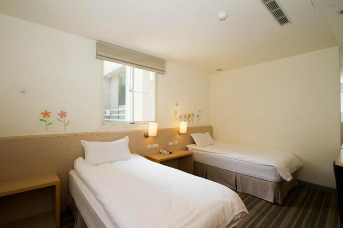 Imagen de la habitación del Hotel Haifu and Suites. Foto 13