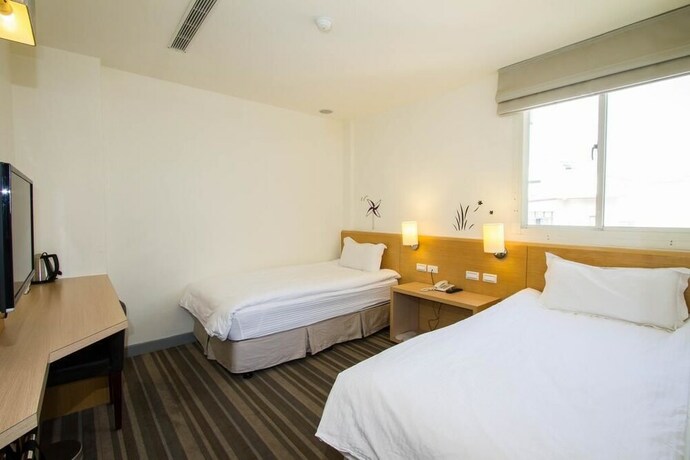 Imagen de la habitación del Hotel Haifu and Suites. Foto 15